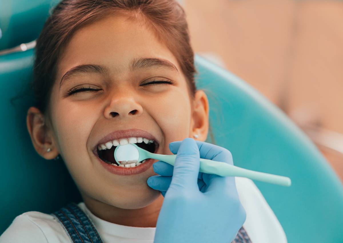 featured image for tips to prepare your kid for a dental visit