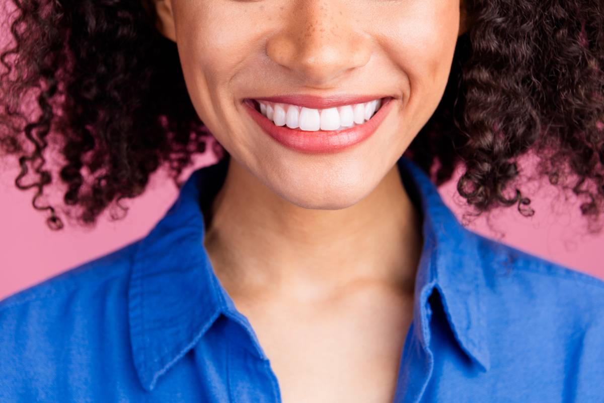 Smiling woman with dental veneers.